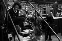 Michelle and her kids wait behind the stage.