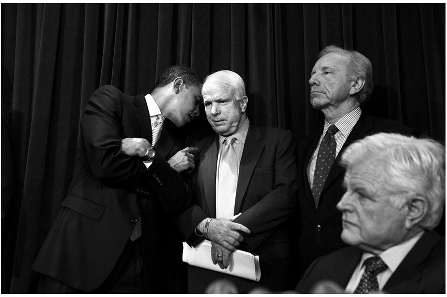 Whispering to McCain at a press conference. : The Rise of Barack Obama : Pete Souza Photography